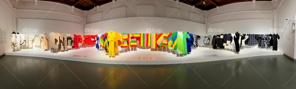 Amazing panoramic photo of bright designer clothes in Design museum collection exhibition of Nurmesniemi modern desigh