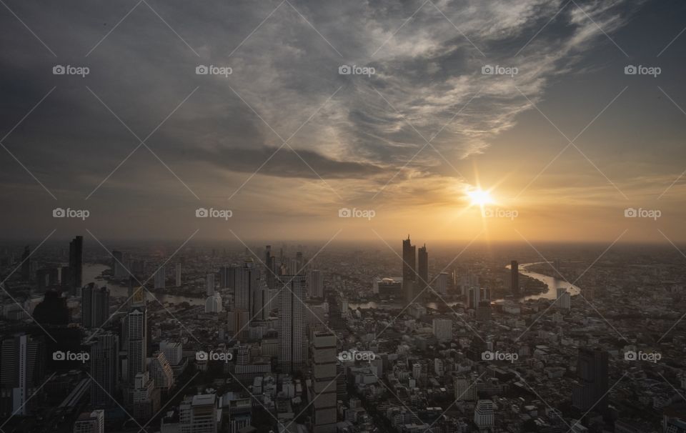 Beautiful sunset moment over skyscraper in the big city 