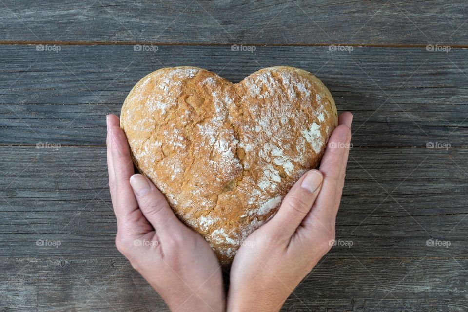 bread in woman's hands