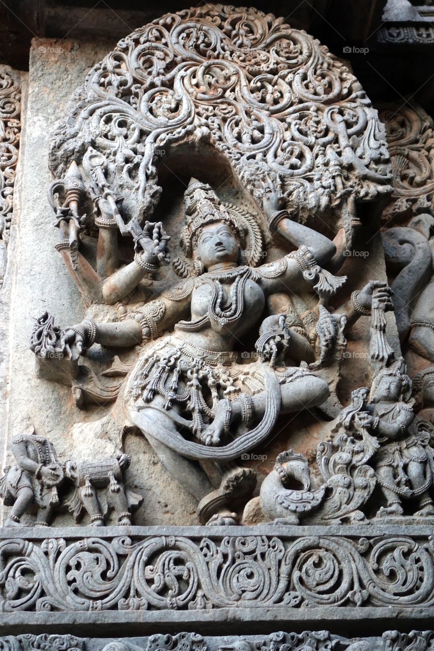 Halebeedu Hoysaleeswara temple - Goddess Saraswati - Displays Wisdom (in upper right hand) and knowledge (in lower left hand) - Emphasis on wisdom