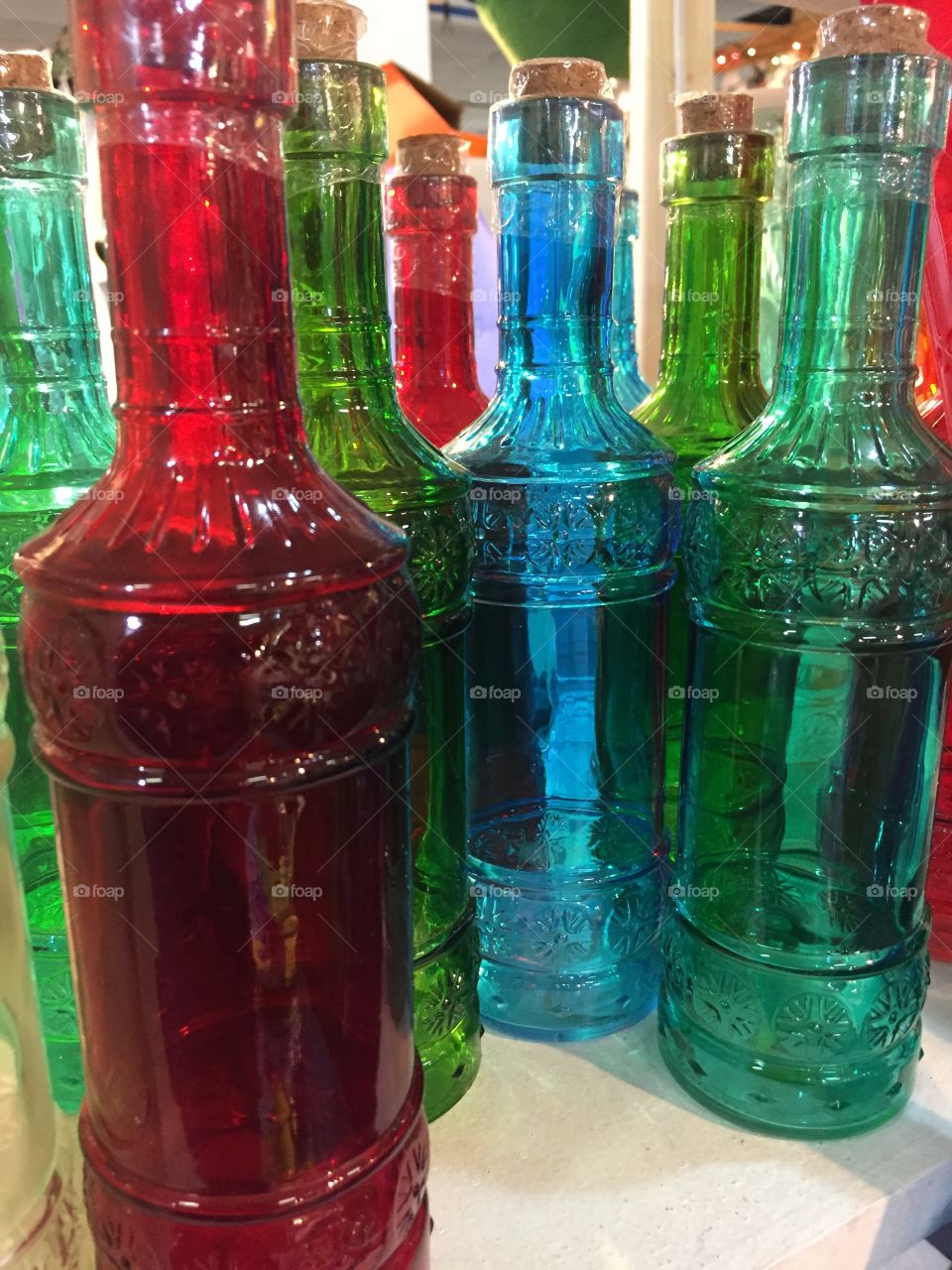 Brightly multicolored bottles 