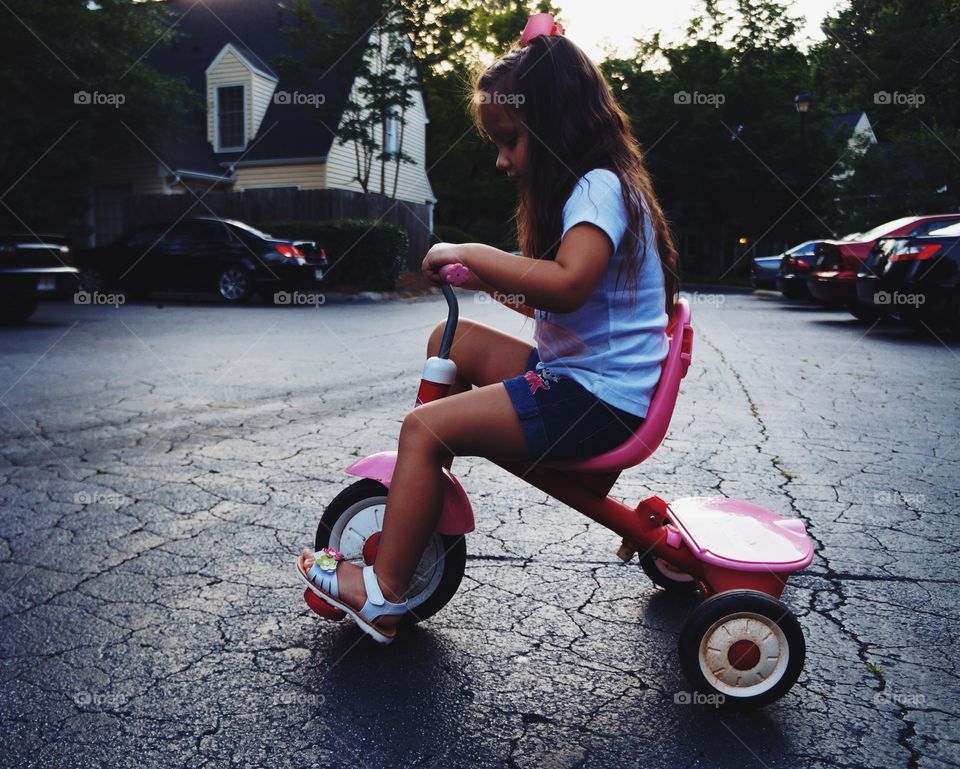 riding her trike