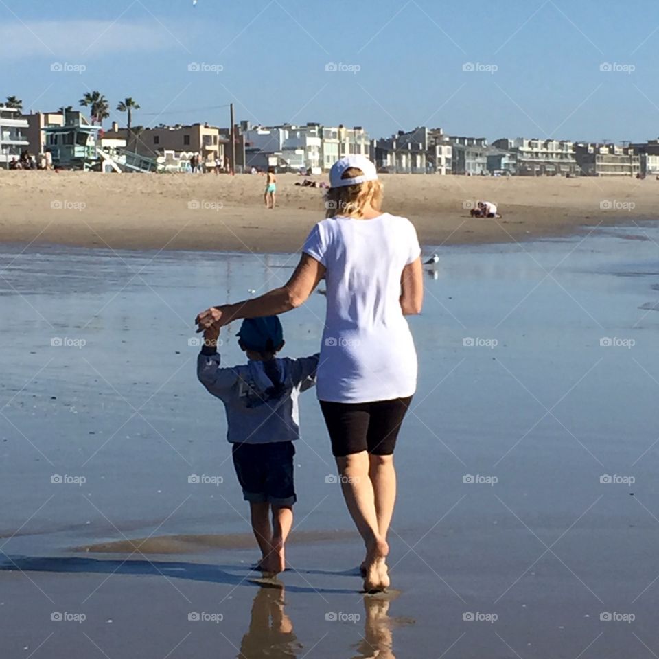Strolling with Mom on the beach