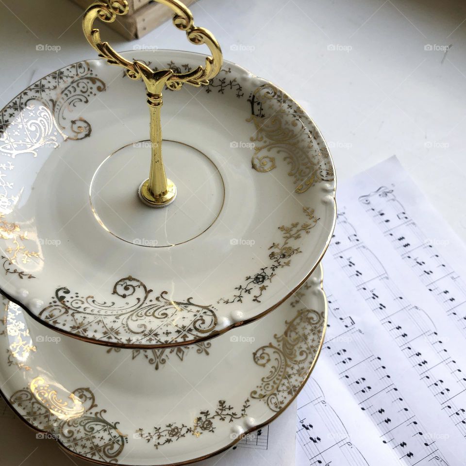 Antique porcelain candy rack with golden ornament