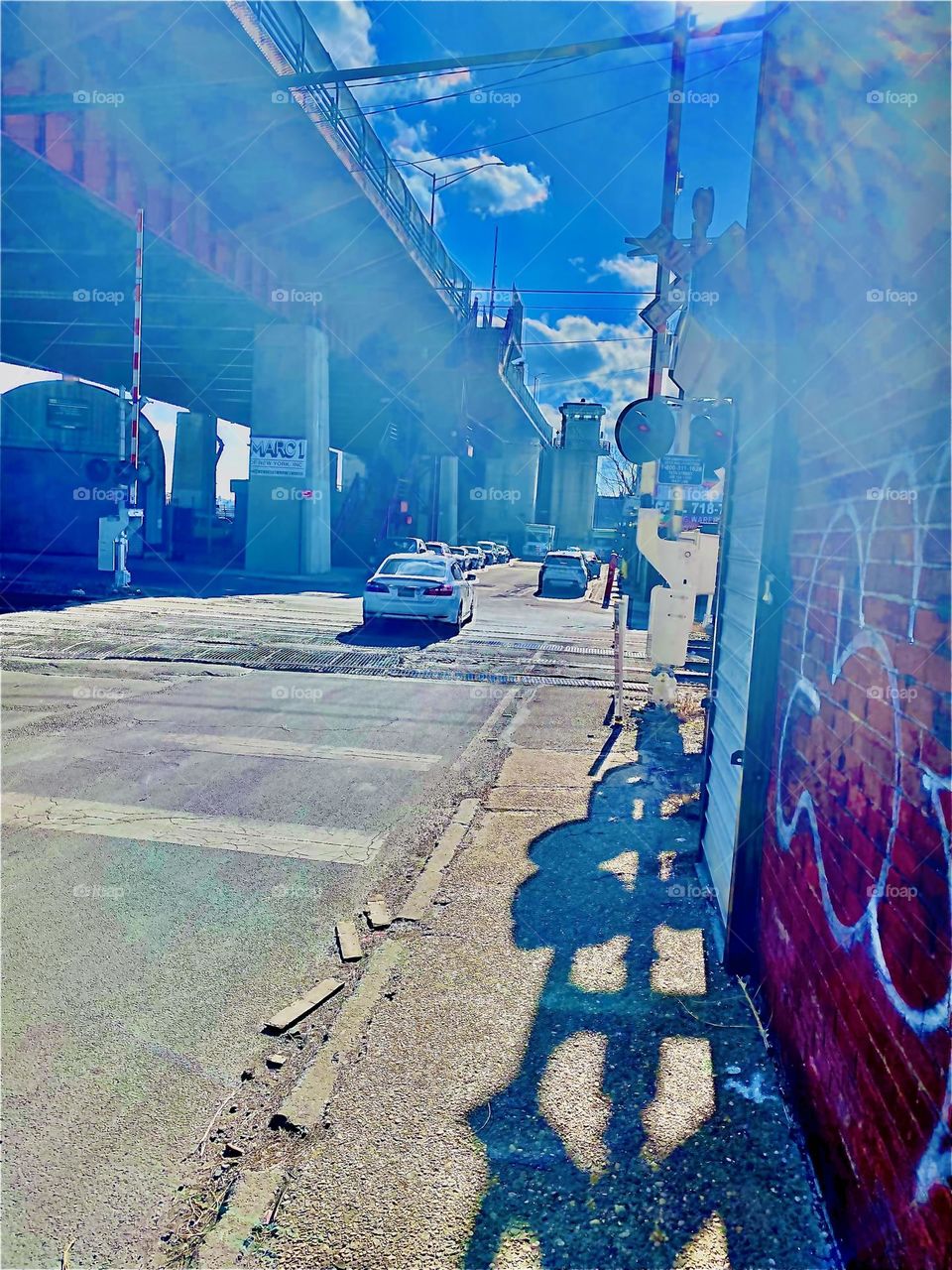 One of several stunning photographs taken just today on January 17, 2022 walking towards our boat in the East River at Newtown Creek in LIC, Queens, NY. The bright sunshine caused interesting lens flares and refraction effects. Hypnotic Productions