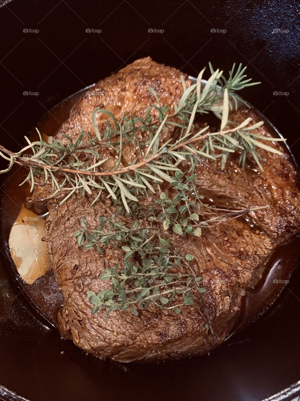 Roast with rosemary and thyme cast iron pot