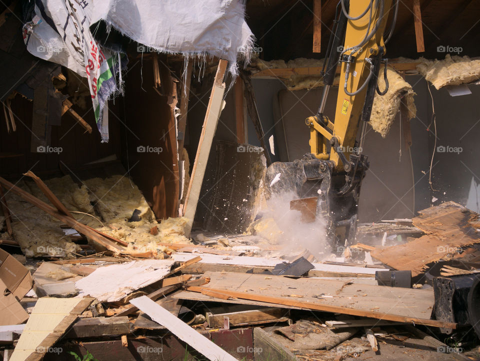 Excavator Bucket Breaking Through the Floor while Demolishing a Hurricane Harvey Damaged Home
