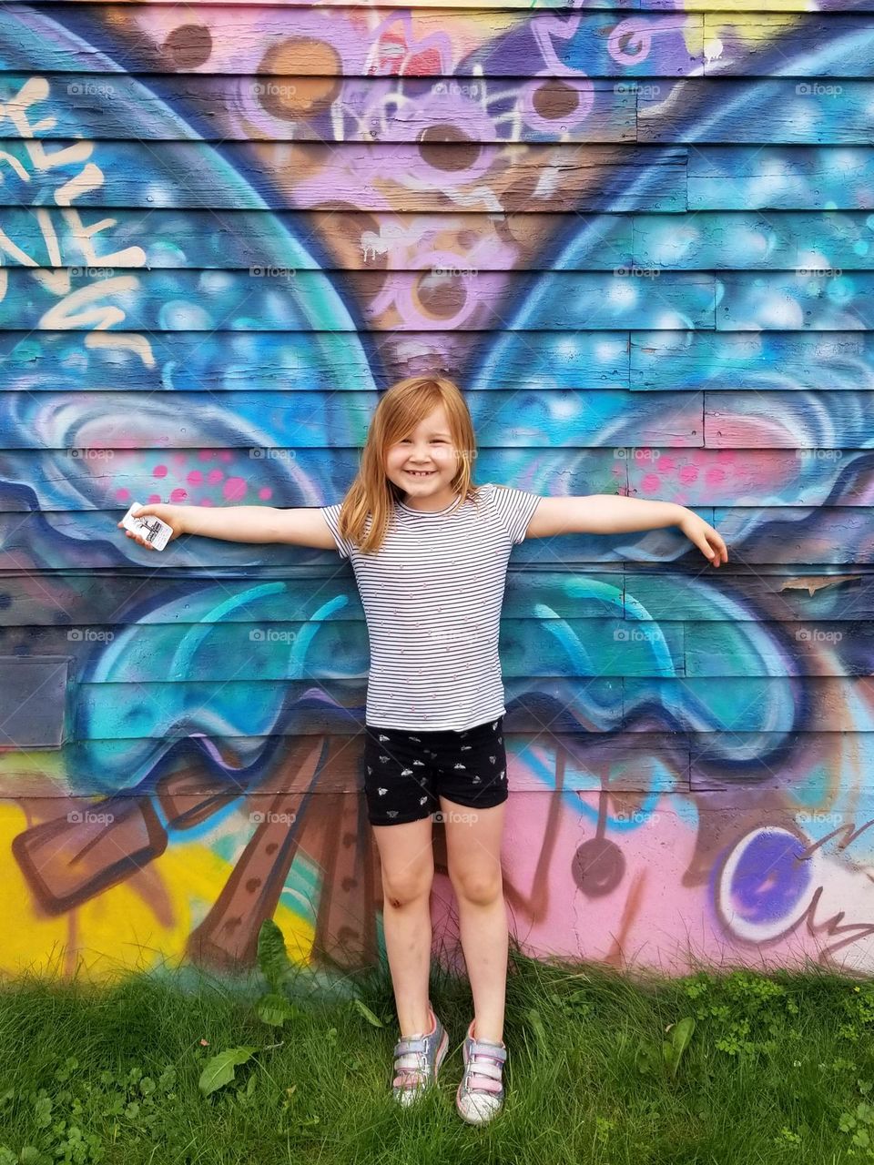 Beautiful butterfly graffiti on the side of The General Store Cafe in Spring Green, Wisconsin.