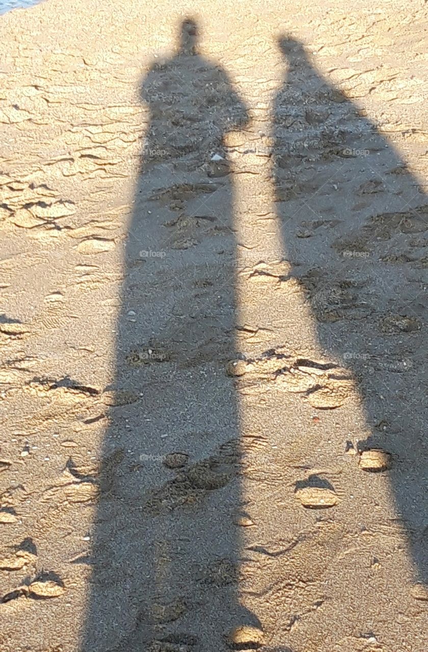 shadows on the beach in Normandy