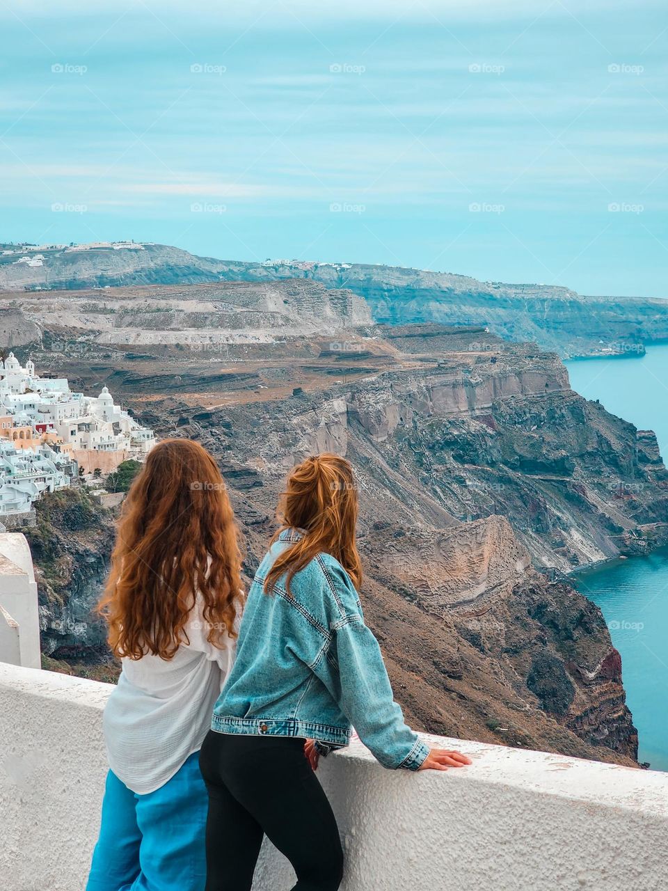 Watching over Santorini together