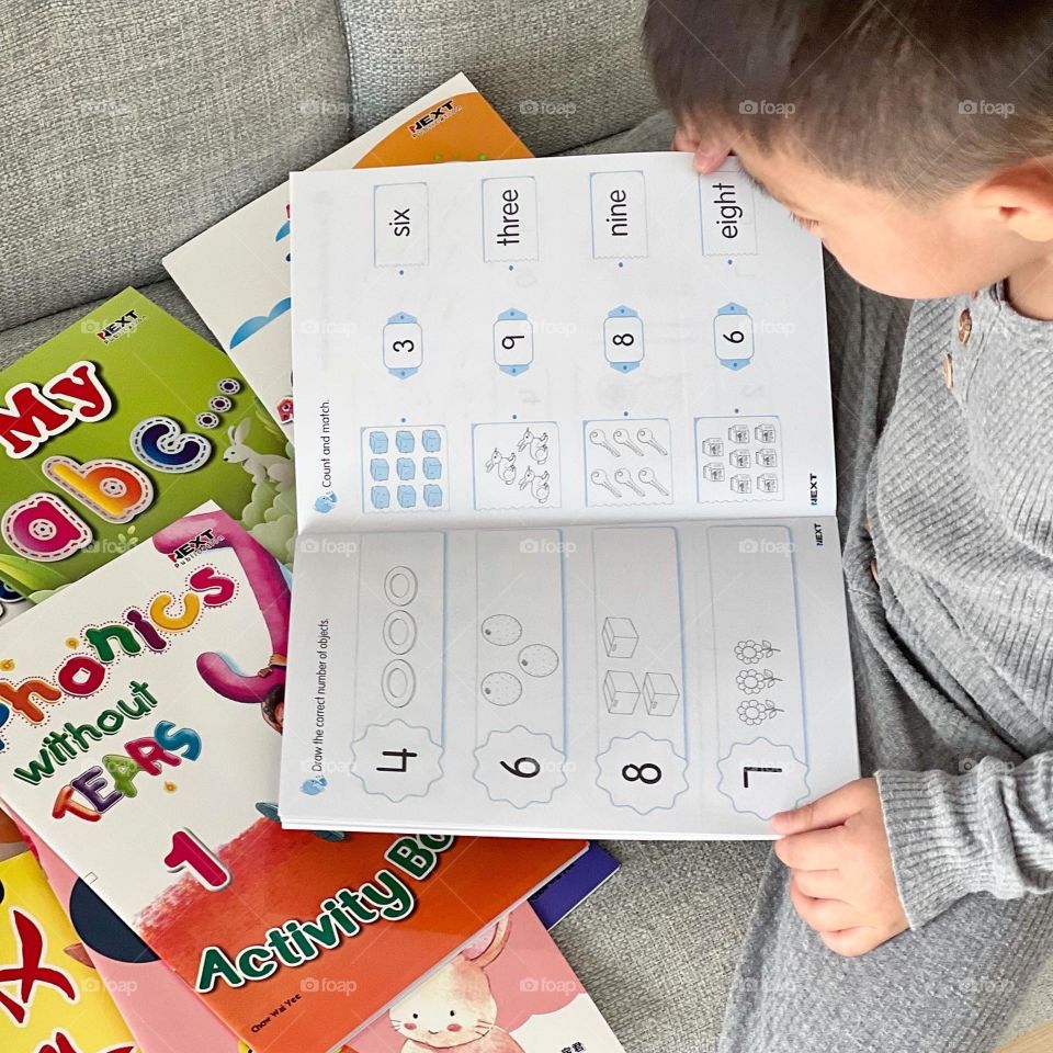 Asian Preschooler with books 