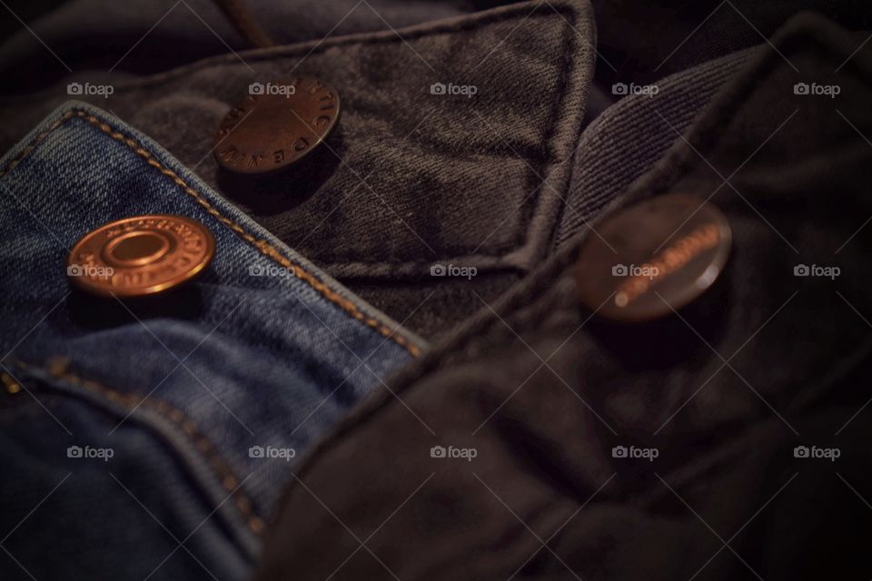 Blurred authentic denim buttons