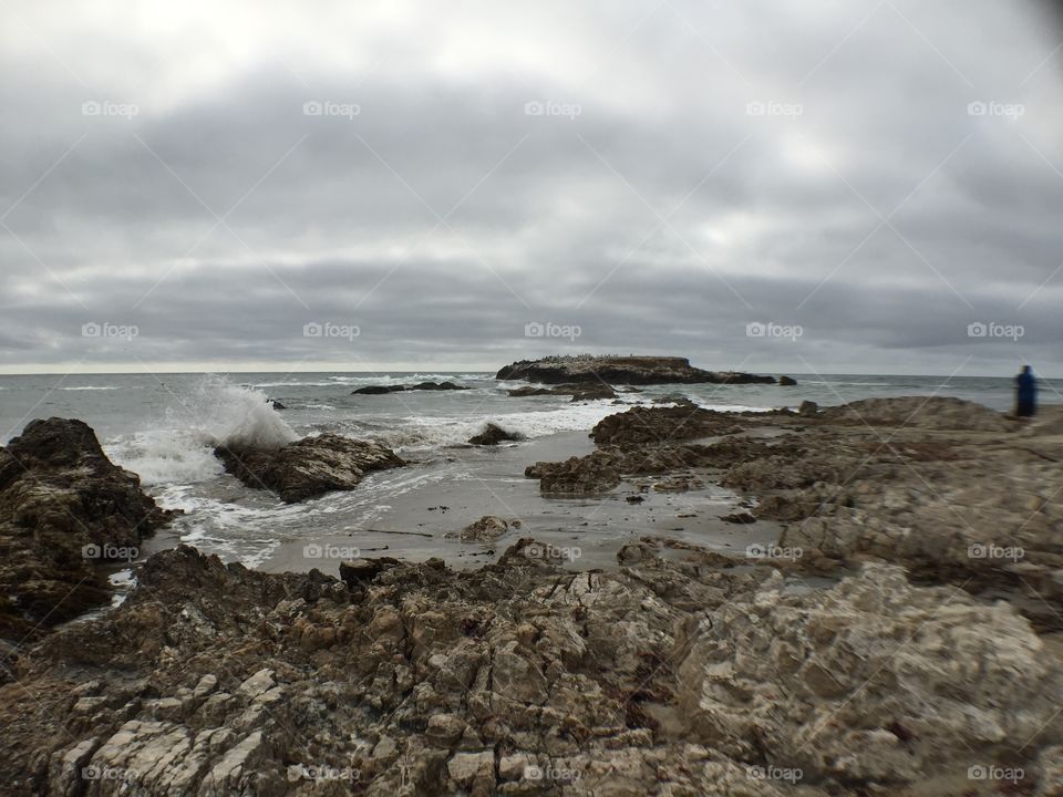 Rocky. Rocky coast of California, something therapeutic about breathing lungs full of fresh air while watching waves crash.