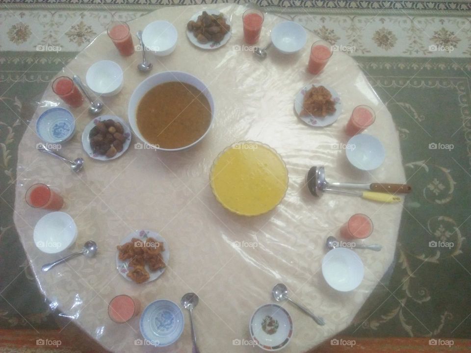 Moroccan table in ramadan month: various soups and dates.