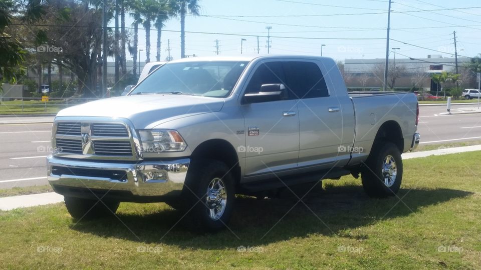 wheelchair accessible 2012 Dodge Ram Megacab 2500HD Longhorn with only 24,000 miles  that I need but cannot afford at a price of$49,900 on my Disability & am currently unemployed. As my wheelchair accessible 2003 Chevrolet Silverado with a 6.0L is getting a rear main seal leak at 150,000 miles & I volunteer to transport horses to events such as Special Olympics for a 501c3 that provides Equine Assisted Therapy to Special Needs children with Autism, Down Syndrome, CP, MS & such on the weekends.