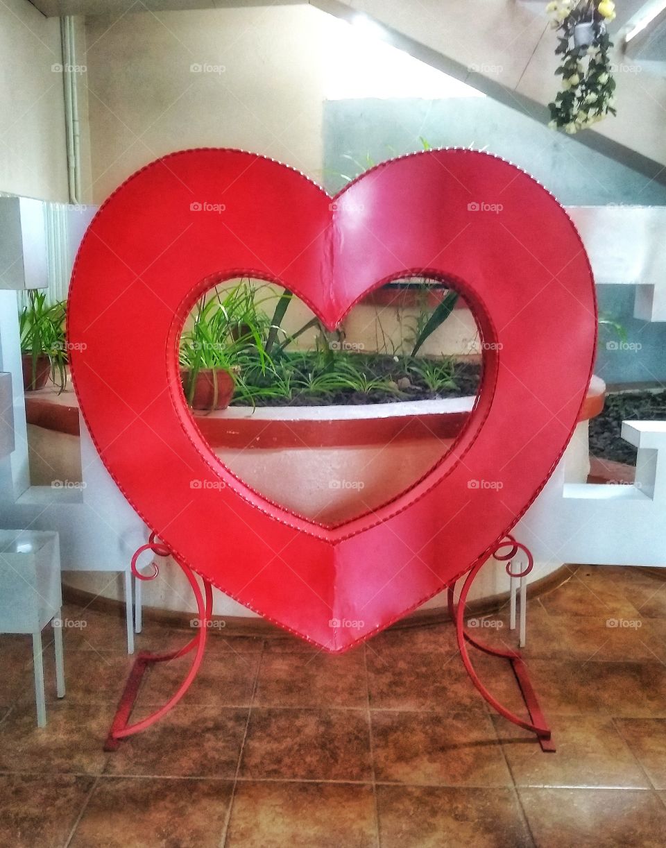 Symbolic big red metal heart