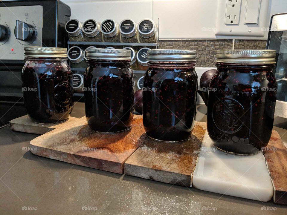 Home canning. Food Preservs. Homemade blackberry jam. Stocking the pantry. Living off the land. Jam in mason jars. hot water canning.