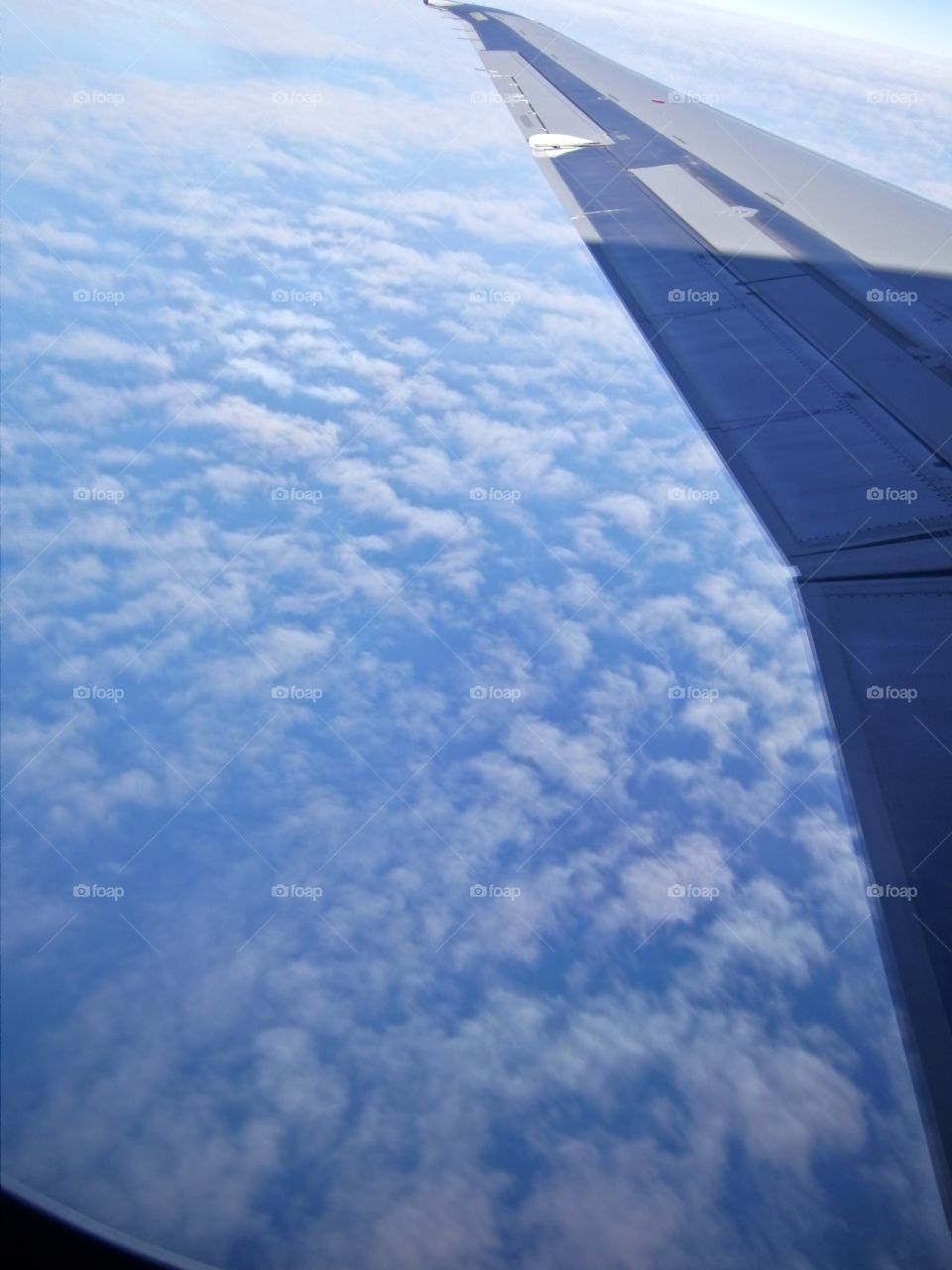The Clouds Beneath My Wing