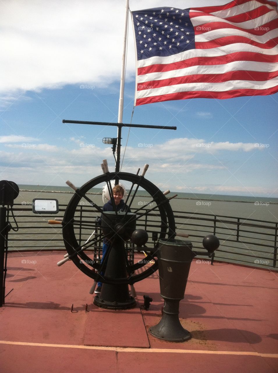 American flag flying in ship
