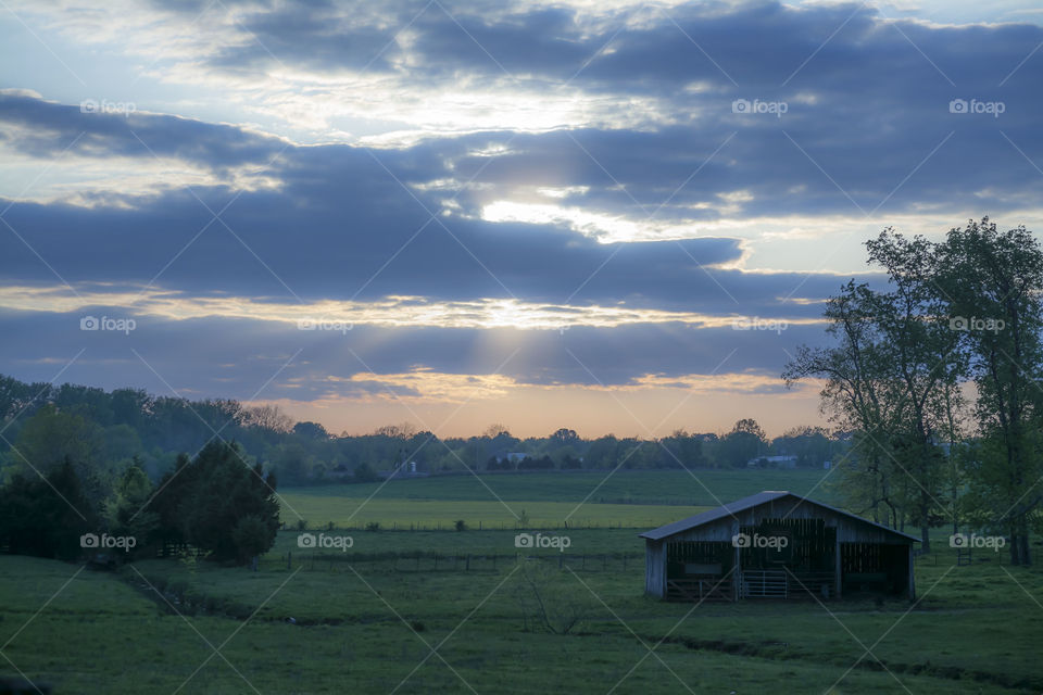 farm sunset. beatiful sky over the farm
