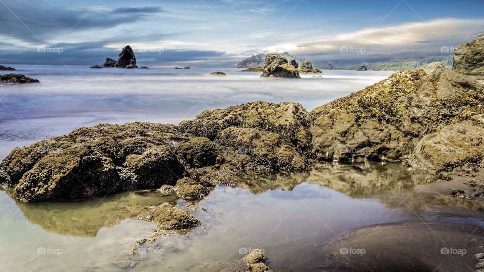 Scenic view of rocky coastline, California