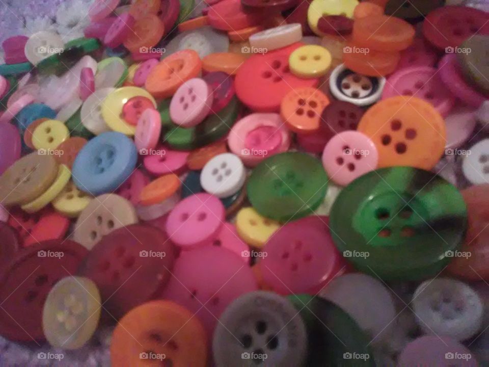 so many beautiful , colorful and bright buttons that will bring a smile to your face with all that color.