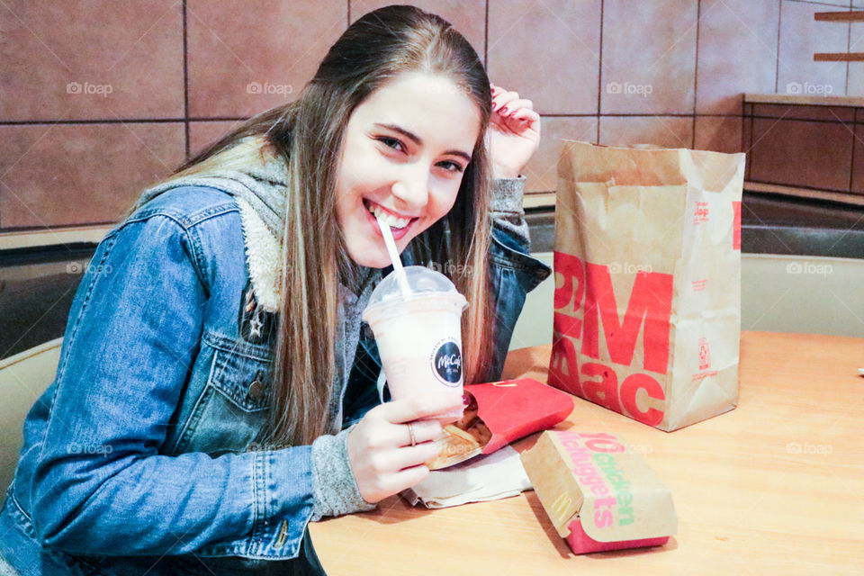 McDonald’s  chicken nuggets , Big Mac and strawberry shake.