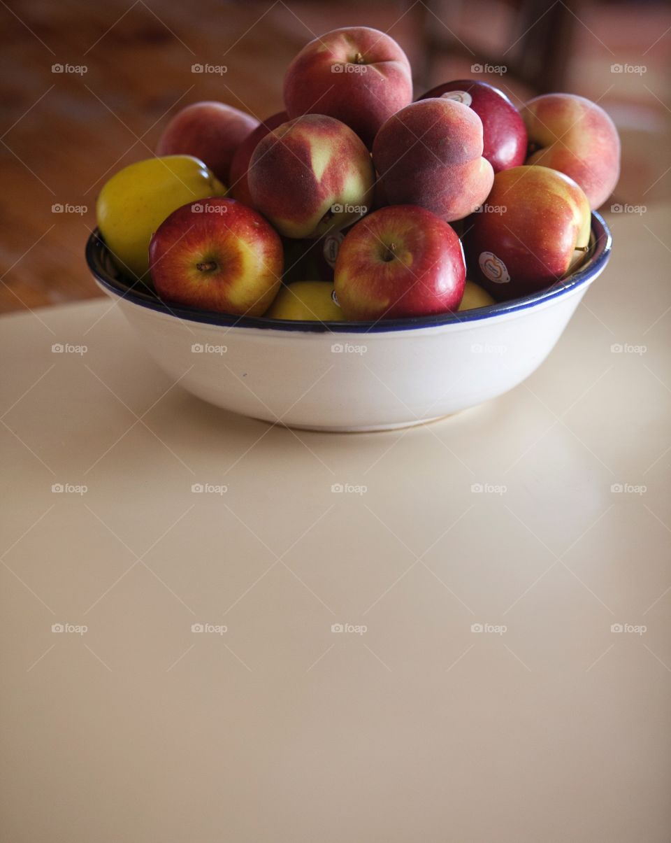 Peaches on a bowl 