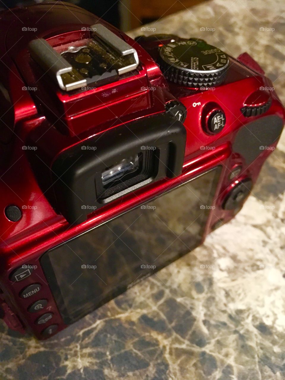 Nikon camera, red. Close up view. Nikon D3300