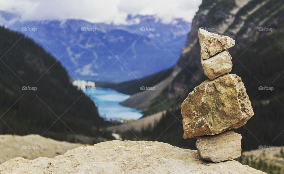 Stack of rocks overlooking Lake Louise in Banff 