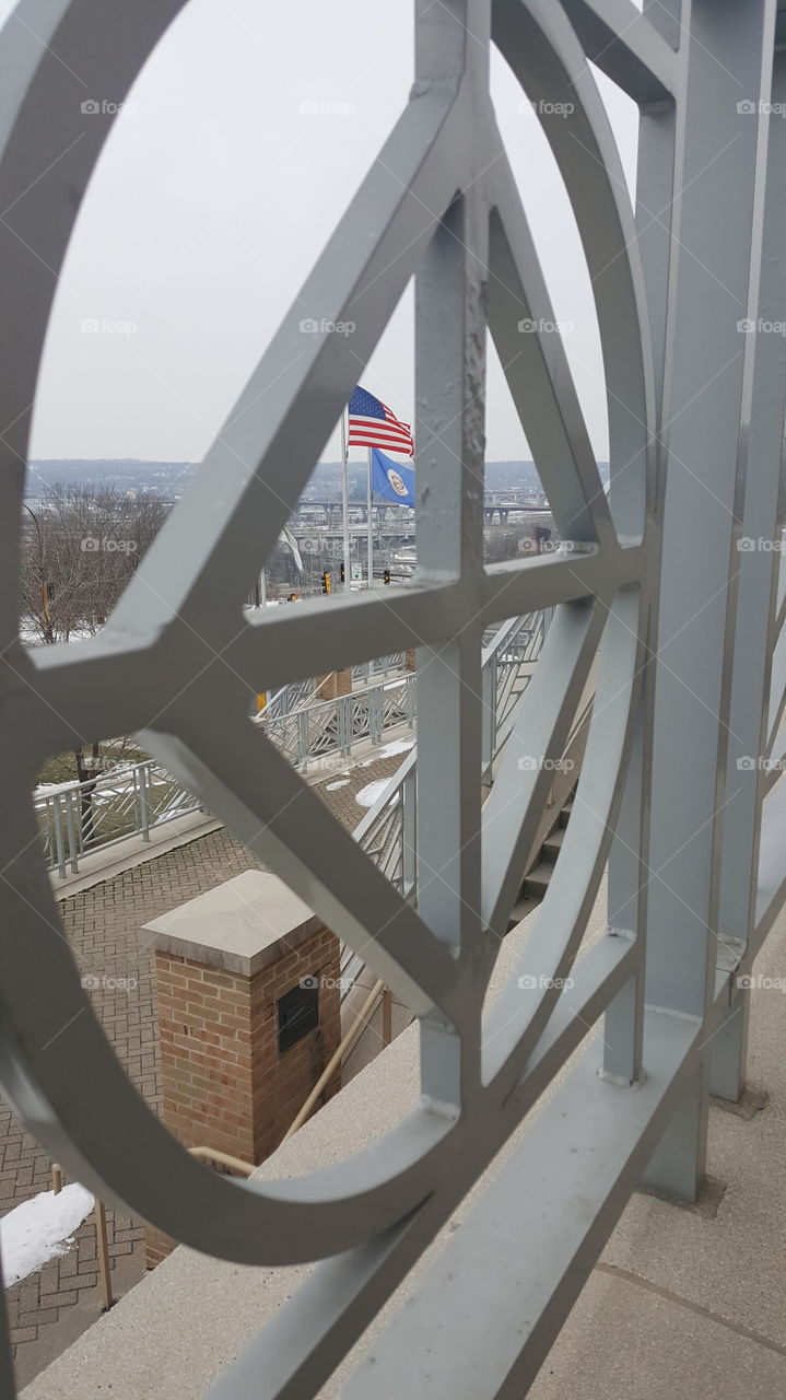 Interesting view of the flags and staircase at metro state St. Paul MN