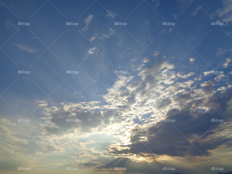 clouds background sunlight rays