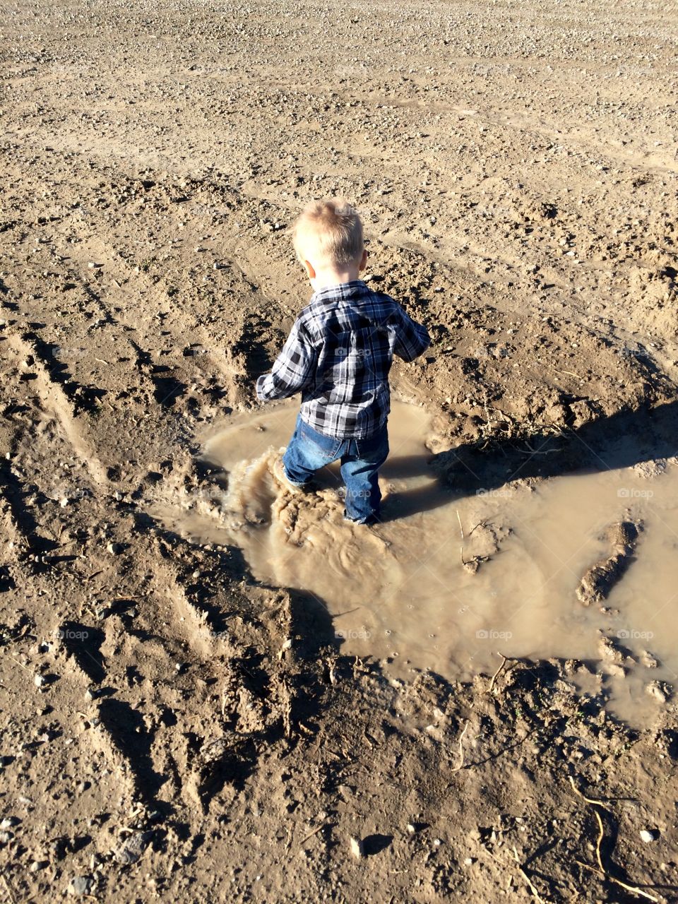 Boy in Mud