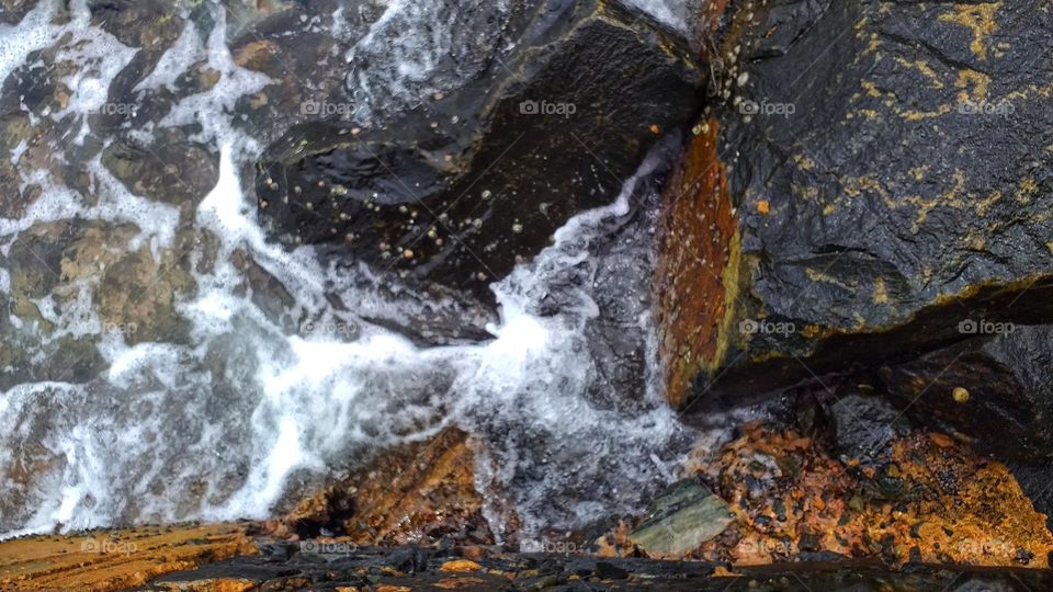 Seaside - sstones and wave