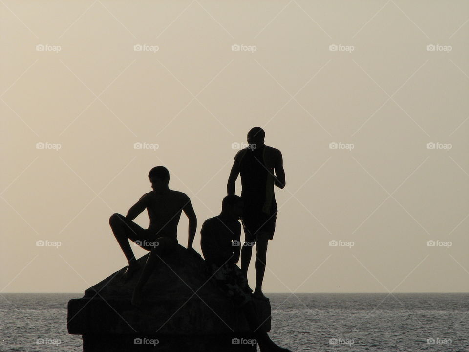 Boys hanging out in Malecon