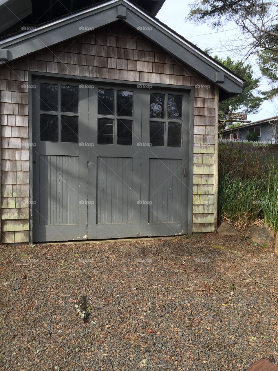 Garage door with shake siding