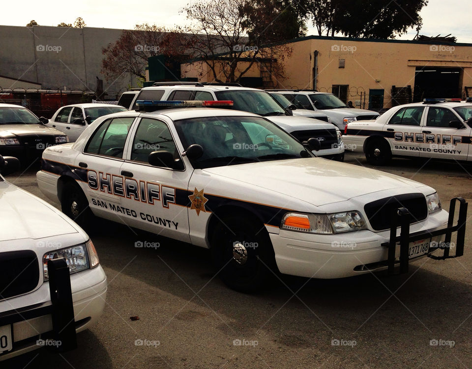 County parking lot full of police cars