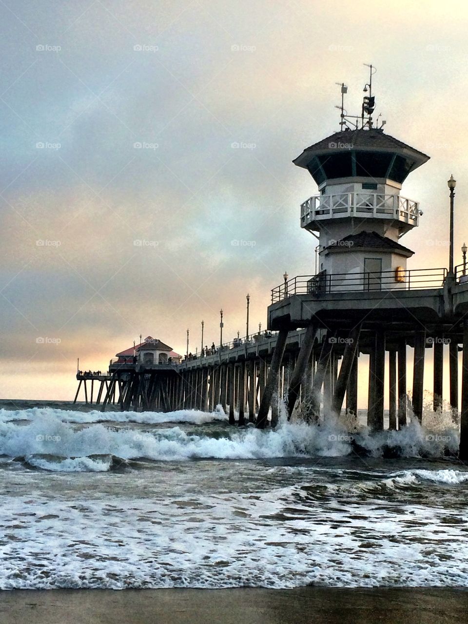 Spring Sunset. Crashing waves last night under the pier.