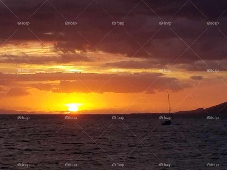 Sunset and boat, viewed from Kihei, Hawaii