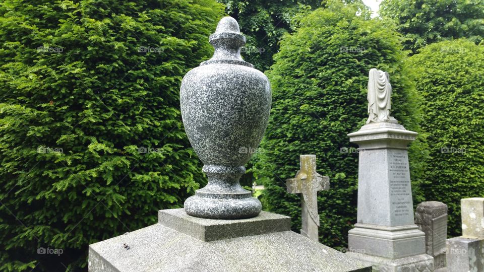 English cemetery
100 + years old graves
Some people think graveyard and cemetery mean the same, but, if we want to be a little nitpicky, we should say that graveyard is a type of cemetery, but a cemetery is usually not a graveyard. To understand the difference, we need a little bit of history.
From about the 7th century, the process of burial was firmly in the hands of the Church (meaning the organization), and burying the dead was only allowed on the lands near a church (now referring to the building), the so-called churchyard. The part of the churchyard used for burial is called graveyard, an example of which you can see in the picture.
As the population of Europe started to grow, the capacity of graveyards was no longer sufficient (the population of modern Europe is almost 40 times higher than it was in the 7th century). By the end of the 18th century, the unsustainability of church burials became apparent, and completely new places, independent of graveyards, were devised—and these were called cemeteries.
The etymology of the two words is also quite intriguing. The origin of "graveyard" is rather obvious; it is a yard filled with graves. However, you might be surprised to hear that "grave" comes from Proto-Germanic *graban, meaning "to dig", and is unrelated to "gravel".
Of course, the word "cemetery" did not appear out of the blue when graveyards started to burst at the seams. It comes from Old French cimetiere, which meant, well, graveyard. Nevertheless, the French word originally comes from Greek koimeterion, meaning "a sleeping place". Isn't that poetic?