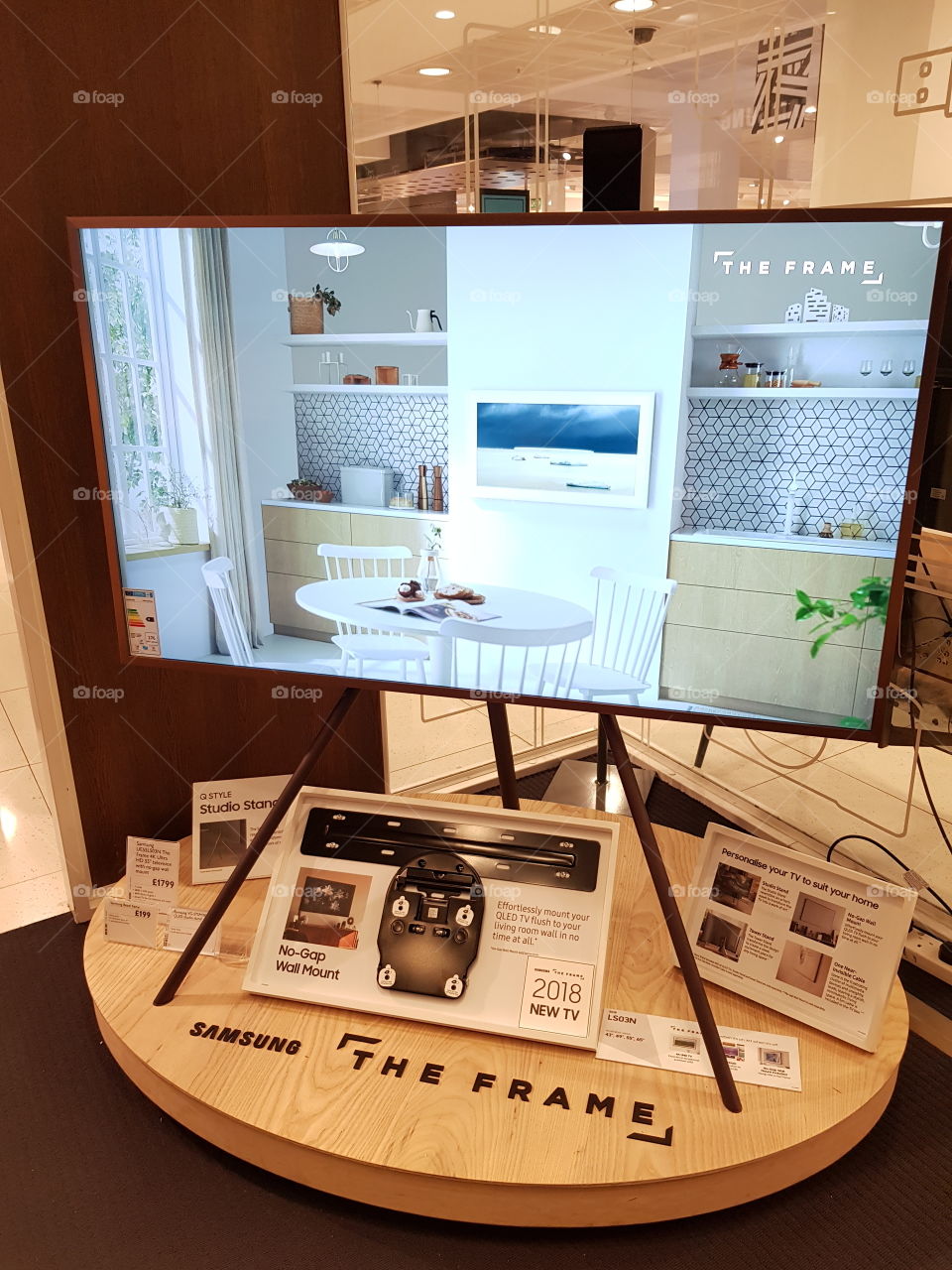 Samsung The Frame TV displaying kitchen set up wall mounted television