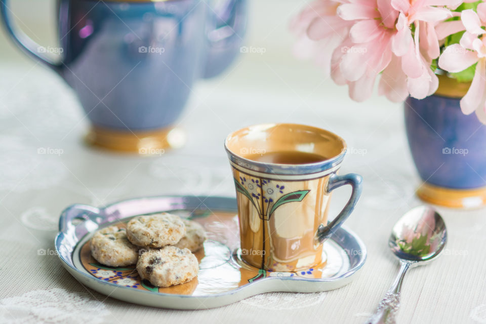 Herbal tea with cookies on tray