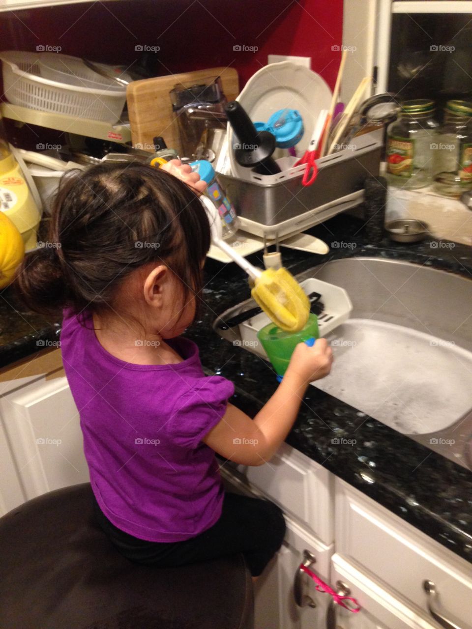 toddler trying to help to clean dishes! it's her first time to wash dishes!