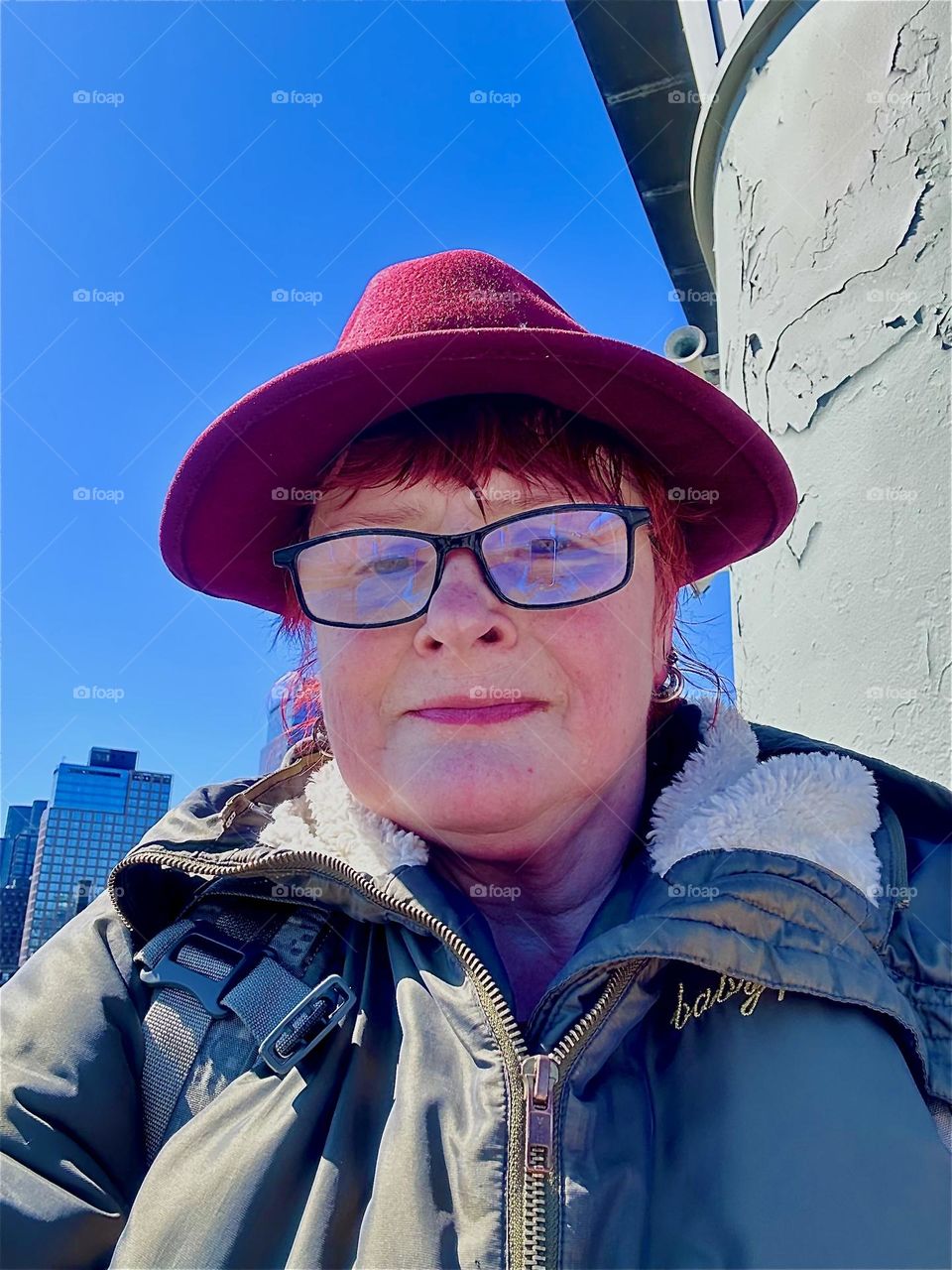 This is me, “Petra Schiller” a.k.a. “Maxine Firefox” a.k.a. “Maximiliane Feuerfuchs” next to the central outpost of the “Pulaski Bridge” at “Newtown Creek” that connects LIC, Queens to “Greenpoint”, Brooklyn. 2024. Hypnotic Productions