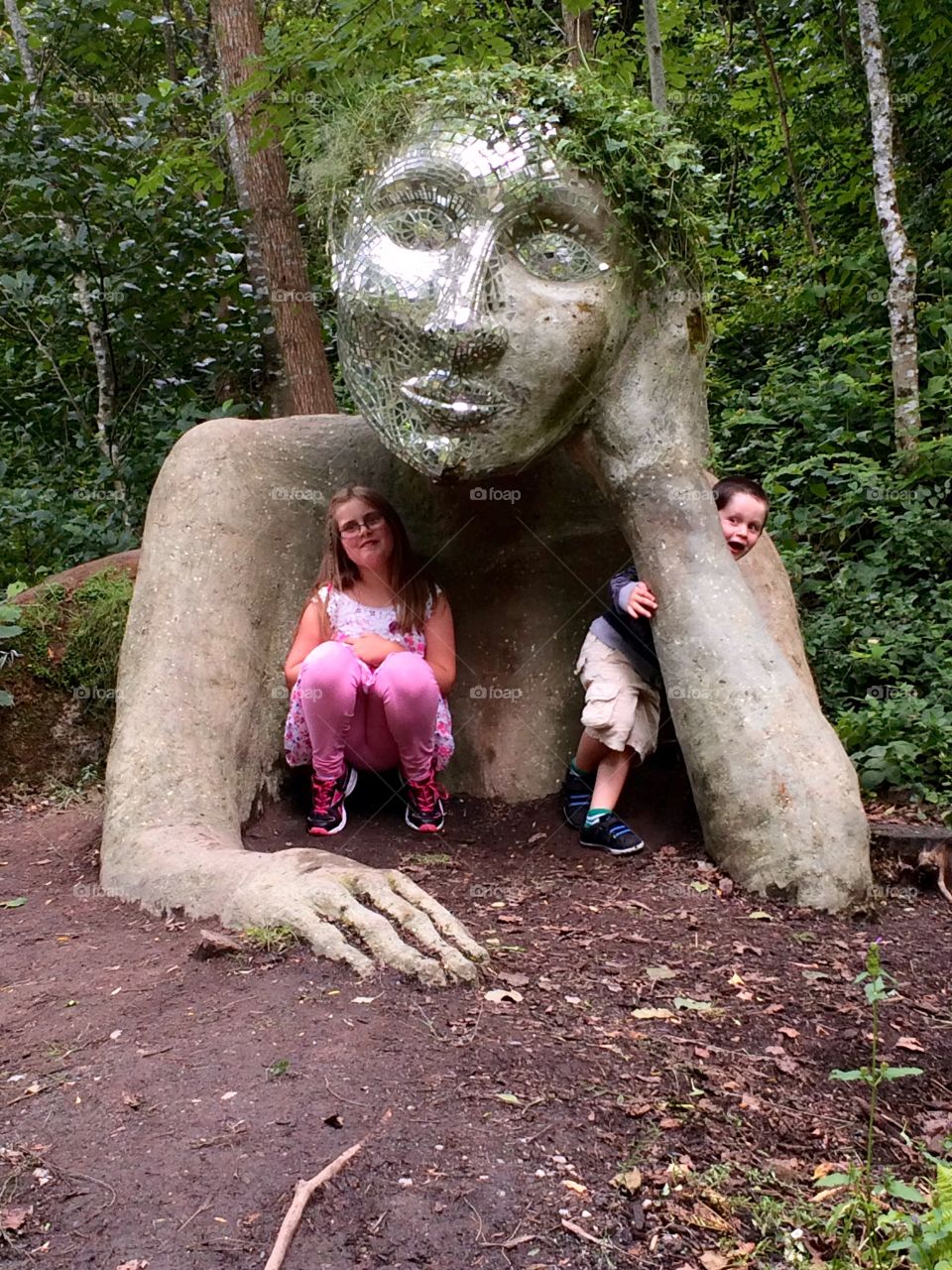 Kids having fun at the Eden Project. Has she/he got legs down there??