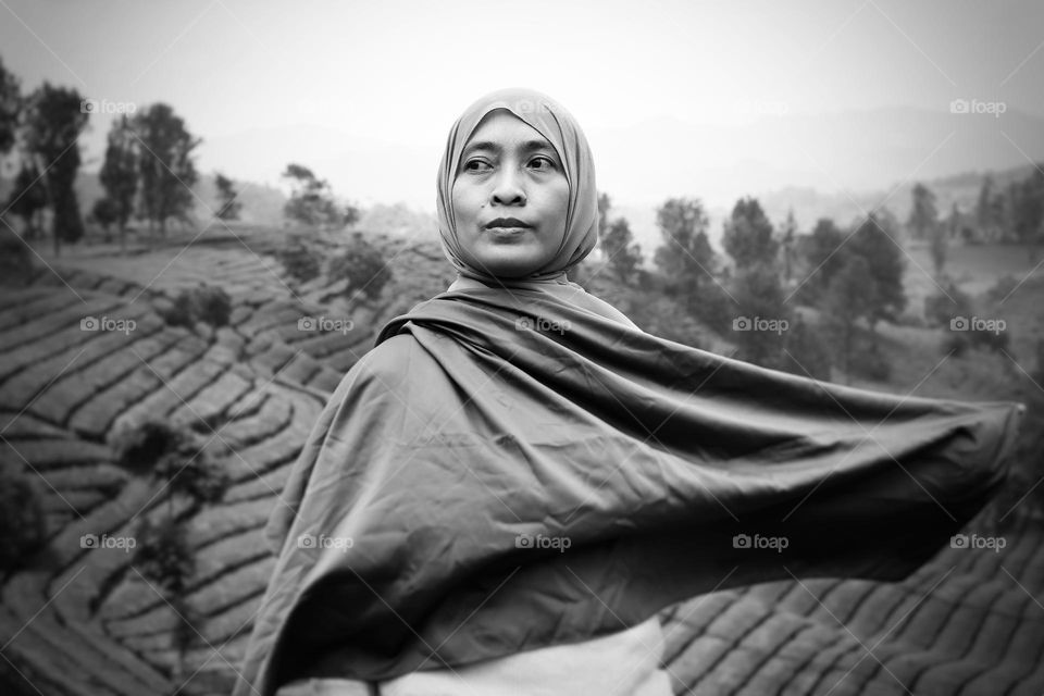 woman standing in field