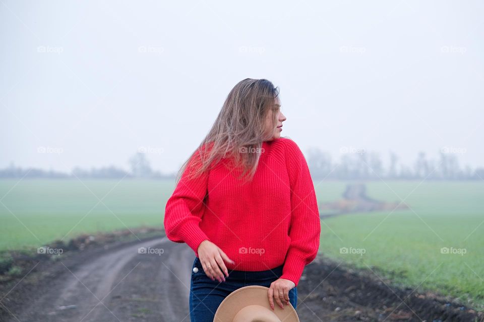 Woman in red sweater