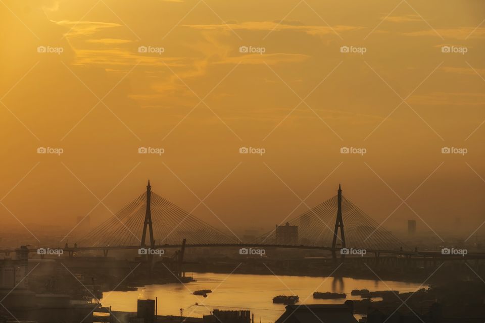 Golden time of twilight moment cover the Buhmibol landmark bridge in Bangkok Thailand