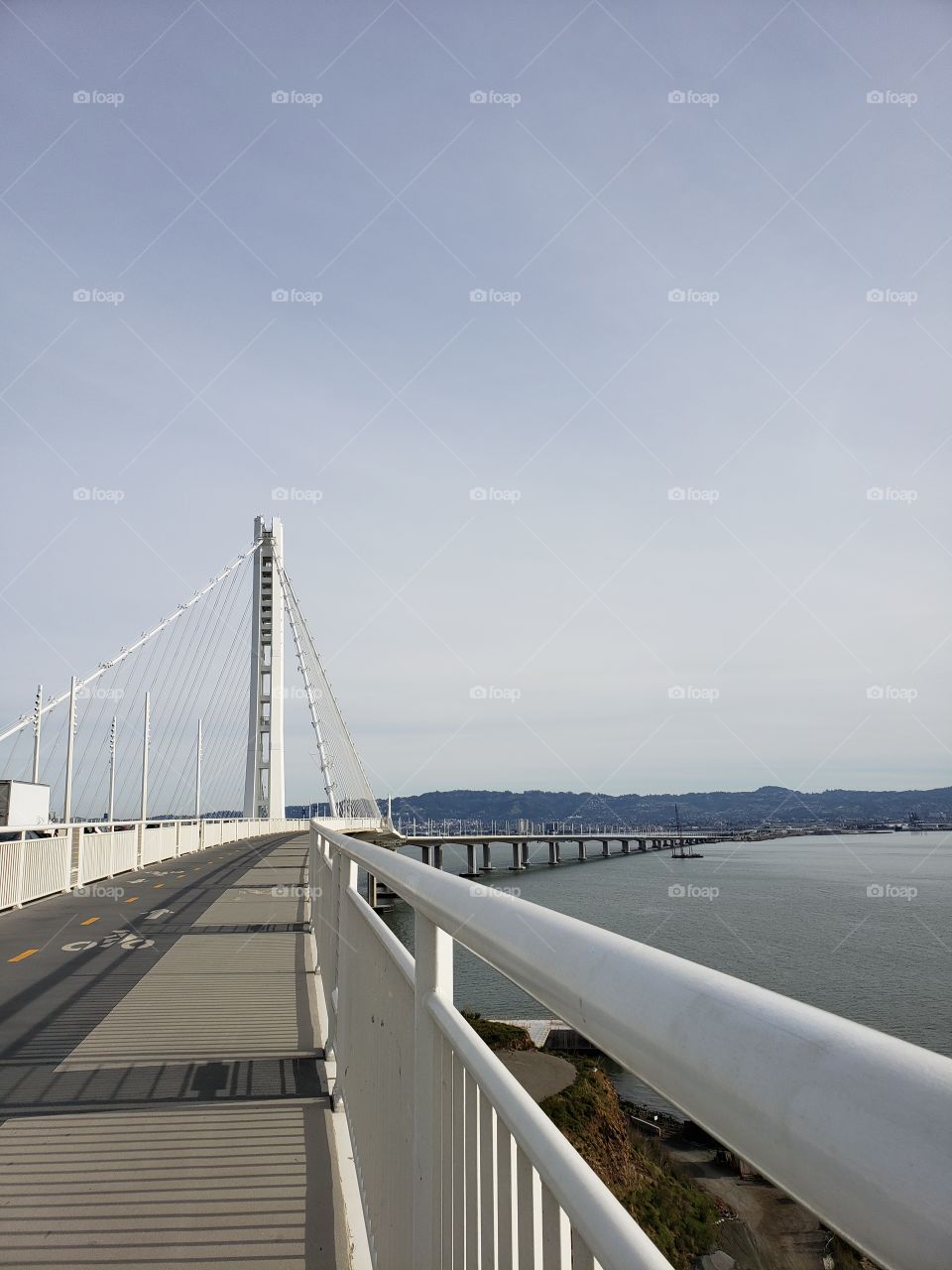 Perspective: Bay Bridge to Oakland from the bridge trail