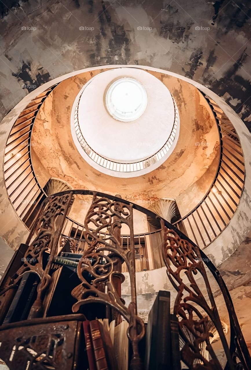 Spiral staircase leading to a beautiful secret room.